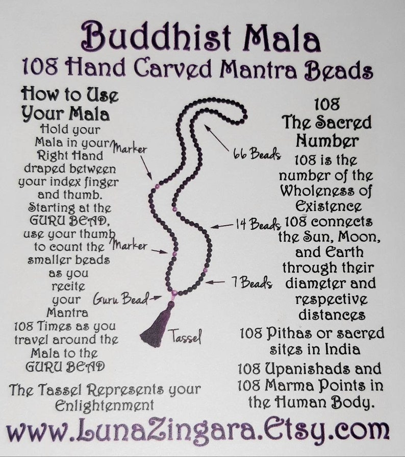 May include: A diagram showing how to use a 108 bead Buddhist mala, a string of beads used for meditation and prayer. The mala is black with purple beads and a tassel. The diagram shows the beads arranged in a circle with arrows pointing to different sections of the mala. The text explains the significance of the 108 beads and how to use the mala for meditation.