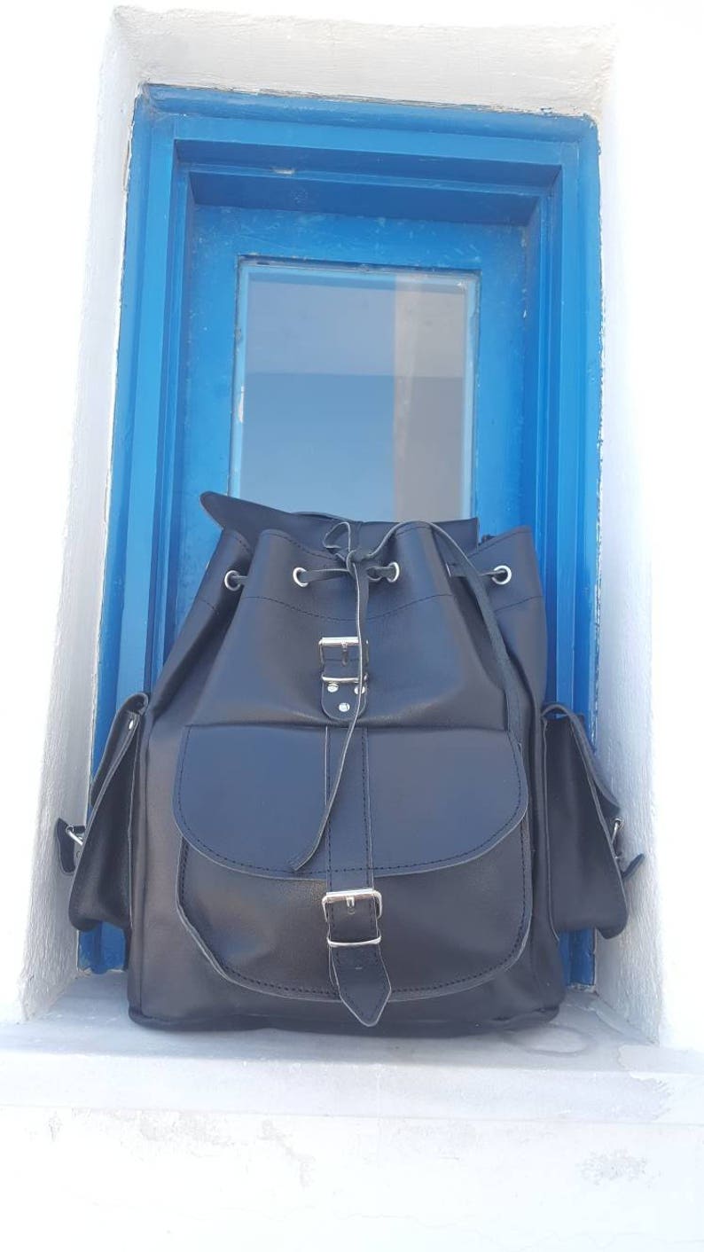 leather backpack with side pockets