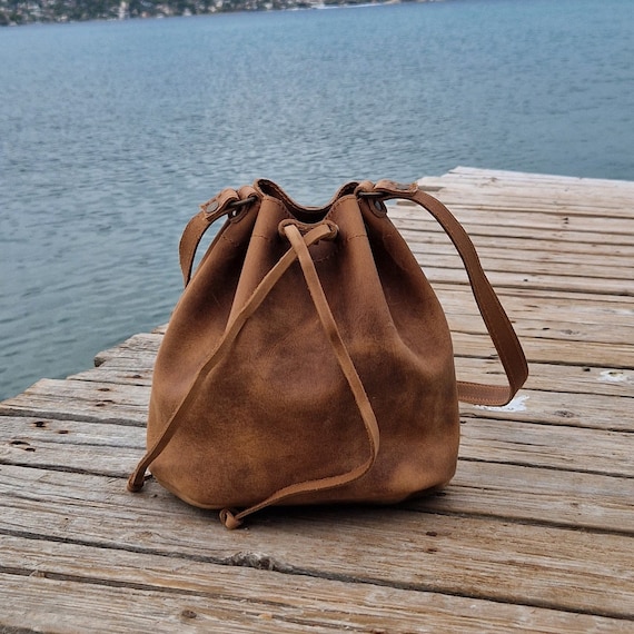 SADI Borsa a secchiello in vera pelle da donna, borsa a tracolla da donna, con tracolla regolabile, bianco, Medium to Large, Moda