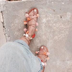 pom pom tie up sandals