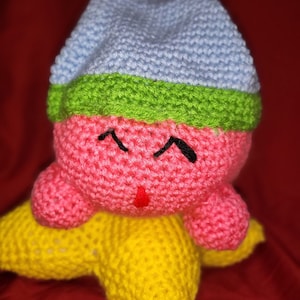 Sleepy Pink Ball on a Warp Star