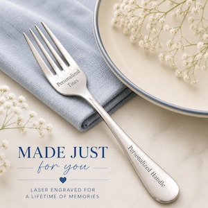 May include: A silver-toned metal fork featuring laser-engraved text on the tines reading Personalized Tines and on the handle reading Personalized Handle. The text MADE JUST for you and LASER ENGRAVED FOR A LIFETIME OF MEMORIES is visible.
