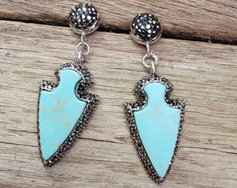 Turquoise Arrowhead and Pave accent earrings. Round Pave encrusted bezel set stud post.