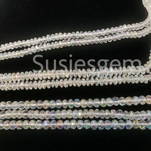 レインボークリスタルのファセットロンデルビーズ（3/5mm/3 x 6mm/4 x 6mm）。天然ホワイトクリスタルの虹色ビーズ。華やかなレインボービーズ。スペーサービーズ 15.5インチ