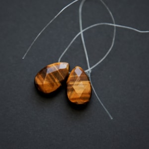 Genuine tiger eye teardrop beads. Yellow tiger eye faceted 16x25mm top grilled teardrops. Two beads