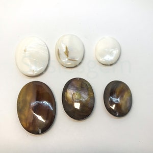 White/ brown MOP oval beads. 30mm/35mm/45mm high luster MOP beads. SIX pieces
