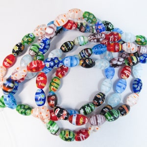 Multicolor Millifiori glass rice beads 8x12mm. Colorful Millifiori art glass beads. 15.5&#39;&#39;