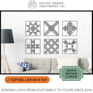 May include: Six gray and white quilt block designs on a white wall. The designs are in a square shape and feature geometric patterns. The text "RUSTED ORANGE CRAFTWORKS CO." is at the top of the image.