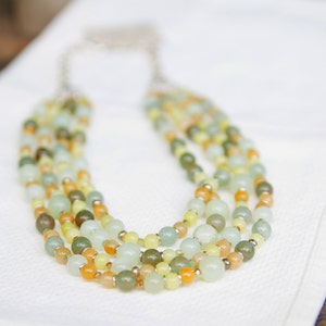 Early June - Jasper, sepentine and glass beads drape beautifully in this gorgeous 3-strand, bib-style piece