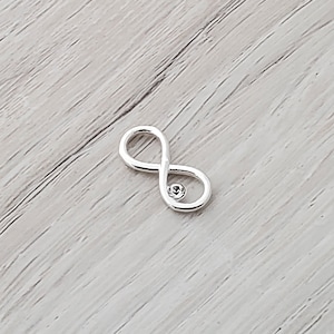 Infinity Knot Pendant with Crystal Sterling Silver