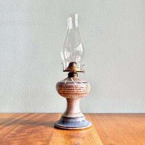 1970s studio pottery oil lamp / signed retro ceramic lamp with glass chimney
