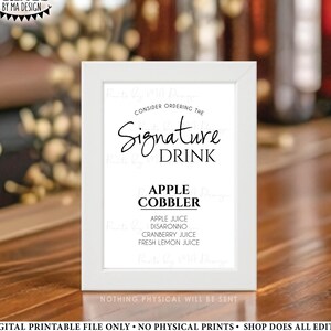 May include: A white framed 5x7 inch digital printable file with the text "Consider Ordering the Signature Drink" and "Apple Cobbler" with a list of ingredients. The image is on a wooden surface.