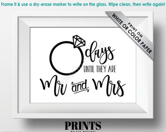 May include: Black and white printable sign with a ring and the text "_ days until they are Mr and Mrs". The sign is framed in a white frame and has the text "PRINT ON WHITE OR COLOR PAPER" in the top right corner.