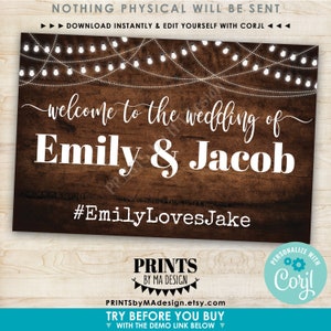 May include: A rustic wooden sign with string lights, announcing "welcome to the wedding of Emily & Jacob" with the hashtag "#EmilyLovesJake". The sign is a printable digital download that can be edited using Corjl.