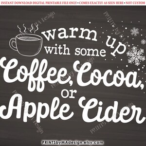 May include: White text on a black chalkboard background reads "Warm up with some Coffee, Cocoa, or Apple Cider". A small white cup of coffee with steam is in the upper left corner. There are small white snowflakes scattered around the text.