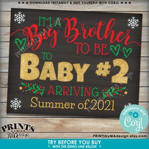May include: A chalkboard style sign with a red and green Christmas theme announcing a new baby is arriving in the summer of 2021. The sign reads "I'm a Big Brother to be Baby #2 Arriving Summer of 2021".