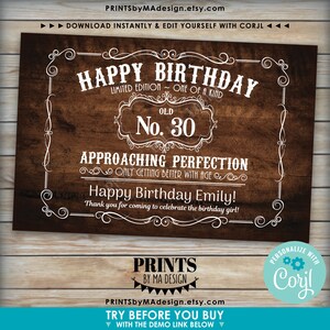 May include: A printable sign with a rustic wood background and white text. The sign says "Happy Birthday Limited Edition - One of a Kind Old No. 30 Approaching Perfection Only Getting Better With Age Happy Birthday Emily! Thank you for coming to celebrate the birthday girl!"