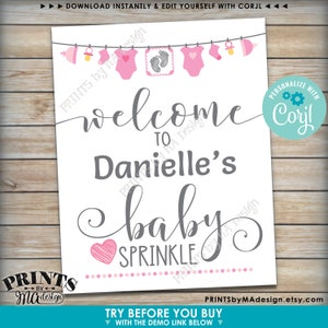 Op de afbeelding: Printbare welkomstbord voor een baby sprinkle met een roze en grijs kleurenschema. Het bord zegt "Welkom bij Danielle's Baby Sprinkle".