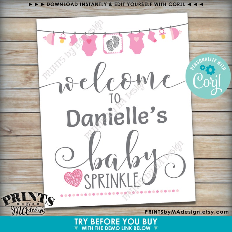 Op de afbeelding: Printbare welkomstbord voor een baby sprinkle met een roze en grijs kleurenschema. Het bord zegt "Welkom bij Danielle's Baby Sprinkle".
