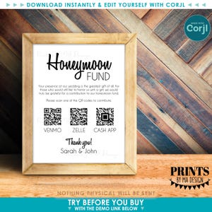 May include: A framed sign with the words "Honeymoon Fund" in elegant script. Below, it includes QR codes for Venmo, Zelle, and Cash App, with the names Sarah & John. The sign is set against a wooden background.