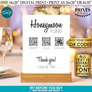 May include: A white sign with the text "Honeymoon Fund" and QR codes for Venmo, Zelle, and Cash App. The sign also includes the text "Thank you! Lisa & Tim" and is displayed in a wooden holder. The sign is a digital printable file.