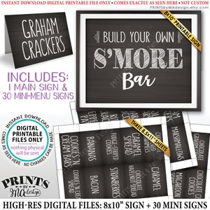 Puede incluir: Conjunto de carteles digitales imprimibles para una barra de s'mores. El cartel principal mide 8x10 pulgadas y dice "Construye tu propia barra de s'mores". Hay 30 carteles más pequeños con ingredientes como galletas graham, malvaviscos, chocolate y caramelo.