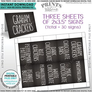 Puede incluir: Etiquetas de señalización imprimibles para una barra de aperitivos. Las etiquetas son negras con texto blanco e incluyen etiquetas como "Graham Crackers", "Peppermint Patties", "Ritz Crackers", "Peanut Butter Cups", "Peanut Butter", "Dark Chocolate Bars", "White Chocolate", "Milk Chocolate", "Chocolate Bars", y "Graham Crackers Marshmallows".
