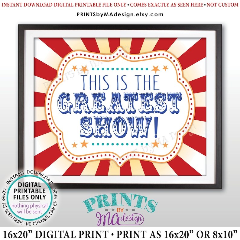 May include: A printable sign with a red, white, and blue circus theme. The sign says "This is the Greatest Show!" in a blue, white, and red font. The sign is framed in a black frame. The sign is 16x20 inches.