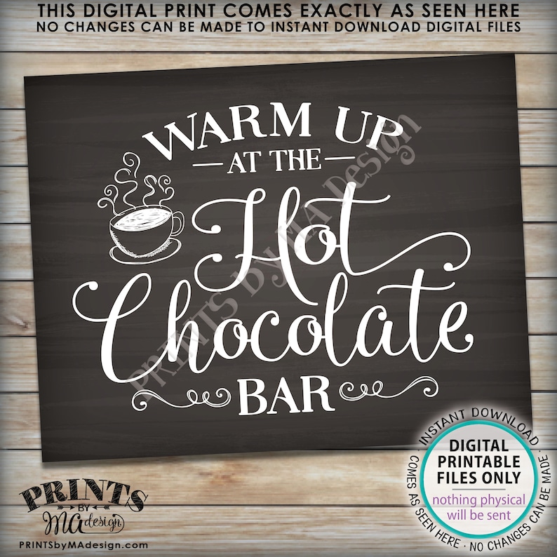 May include: A printable sign with a chalkboard background and white text that reads "Warm Up - At The - Hot Chocolate Bar". The sign also includes a drawing of a cup of hot chocolate with steam coming from it.