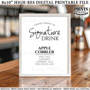 May include: A white ceramic mug with a black handle and the text "But First, Coffee" in a black, bold font. The mug is sitting on a white surface.