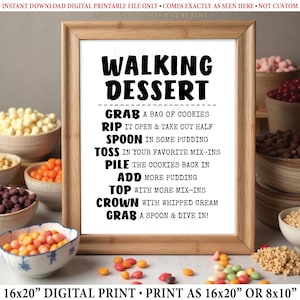 May include: A printable sign with black text on a white background that reads "Walking Dessert". The sign lists instructions for a dessert bar with ingredients like cookies, pudding, and whipped cream. The sign is framed in a brown wood frame and is displayed on a table with bowls of colorful candies.