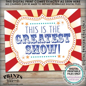 May include: A printable sign with a red and white striped background. The sign has a white oval with a blue and white border. The text "This is the Greatest Show!" is in blue with a white outline. The text is in a circus font. The sign is for a digital download only.