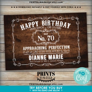 May include: A rustic wood-grain background with a white border and text that reads "Happy Birthday Limited Edition - One of a Kind Old No. 70 Approaching Perfection Only Getting Better With Age Dianne Marie Born October 8, 1953 in Jackson, Michigan". The text is in a vintage style font. Below the text is a white banner with the words "Prints by Ma Design".