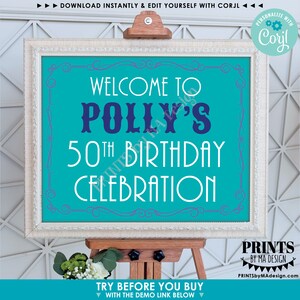 May include: A teal sign on an easel with the text "WELCOME TO POLLY'S 50TH BIRTHDAY CELEBRATION" in white and purple lettering. The sign is framed in white and includes the text "PRINTS BY MA DESIGN".