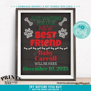 May include: A chalkboard sign with a green and red design announcing the arrival of a new best friend. The sign reads "Just waiting for our new best friend Baby Carroll will be here December 19, 2023".