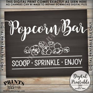 May include: A black chalkboard sign with white text that reads "Popcorn Bar" with a row of popcorn illustrations below. The text "Scoop Sprinkle Enjoy" is below the popcorn. The sign is for a digital printable file only.
