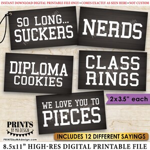 May include: Twelve printable 2x3.5 inch signs with graduation themed sayings in white text on a black background. The sayings include "So Long... Suckers", "Nerds", "Diploma Cookies", "Class Rings", "We Love You To Pieces", and more.
