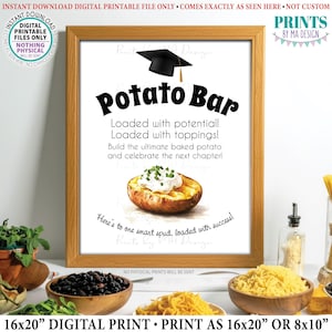 May include: A framed sign featuring a black graduation cap icon above the text Potato Bar, Loaded with potential! Loaded with toppings! Build the ultimate baked potato and celebrate the next chapter! Here's to one smart spud, loaded with success! A watercolor illustration of a baked potato with sour cream and chives is centered below the text.
