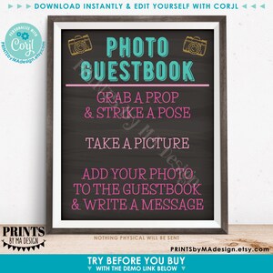 May include: A printable sign with a chalkboard background and a white frame. The sign says "Photo Guestbook" in teal and pink text. It also says "Grab a prop & strike a pose, take a picture, add your photo to the guestbook & write a message".