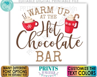 May include: Printable sign for a hot chocolate bar. The sign is white with brown text that says "Warm Up at the Hot Chocolate Bar". There are two red mugs with hot chocolate and whipped cream on either side of the text. The sign is 16x20 inches.
