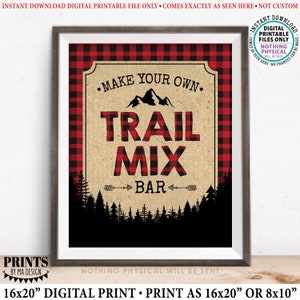 May include: Printable sign with a red and black buffalo check background. The sign says "Make Your Own Trail Mix Bar" with a silhouette of mountains and pine trees.
