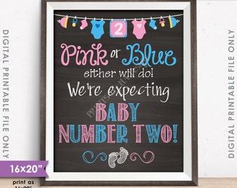 May include: A chalkboard style printable sign announcing a pregnancy with the text "Pink or Blue either will do! We're expecting Baby Number Two!"  The sign is decorated with baby clothes, pacifiers, and footprints in pink and blue.