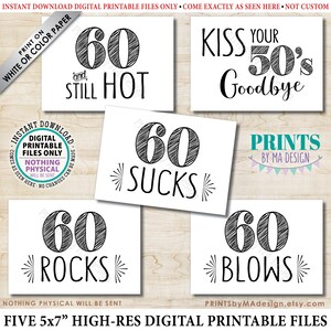 May include: Five printable 5x7 inch cards with humorous text about turning 60. The cards feature a black and white sketched design of the number 60. The text on the cards reads: "60 and still hot", "Kiss your 50's goodbye", "60 sucks", "60 rocks", and "60 blows".