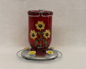 Red glass hummingbird feeder, Hand painted with sunflowers and leaves, 5 feeding ports and a resting pad