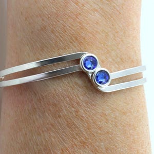 September birthstone : Swarovski Sapphire adjustable silver plated bangle