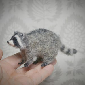 Miniature felted raccoon – tiny handcrafted wool sculpture