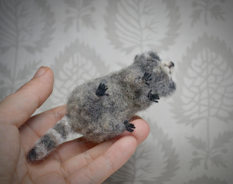 Handcrafted needle felt raccoon – small decorative wool figurine