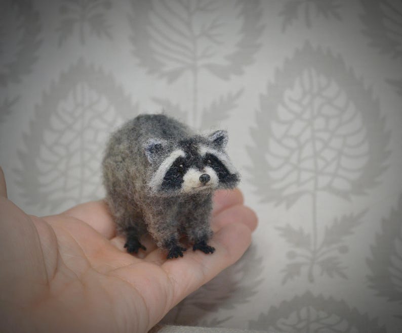 Miniature wool raccoon – handcrafted needle felt sculpture