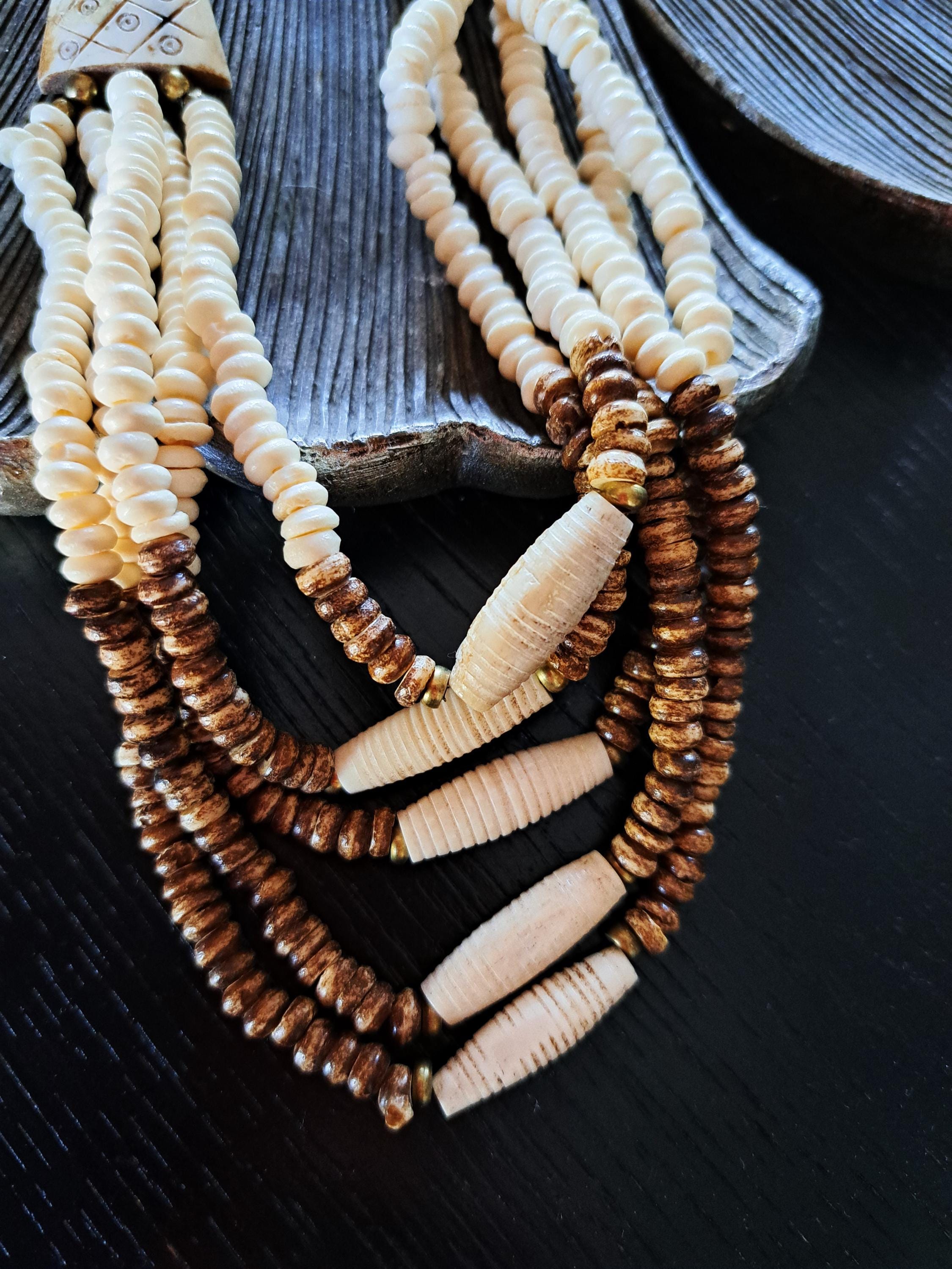 vintage-multi-strand-bone-bead-necklace-with-metal-accents-reto-tribal