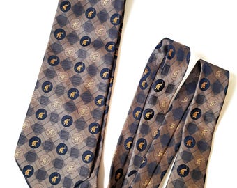 Gravata de seda vintage Jim Thompson, azul marinho e bege, com estampa de elefantes.